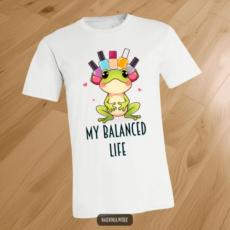 Funny excited green frog balancing a stack of colorful nail polish bottles on its head, on a t-shirt.
